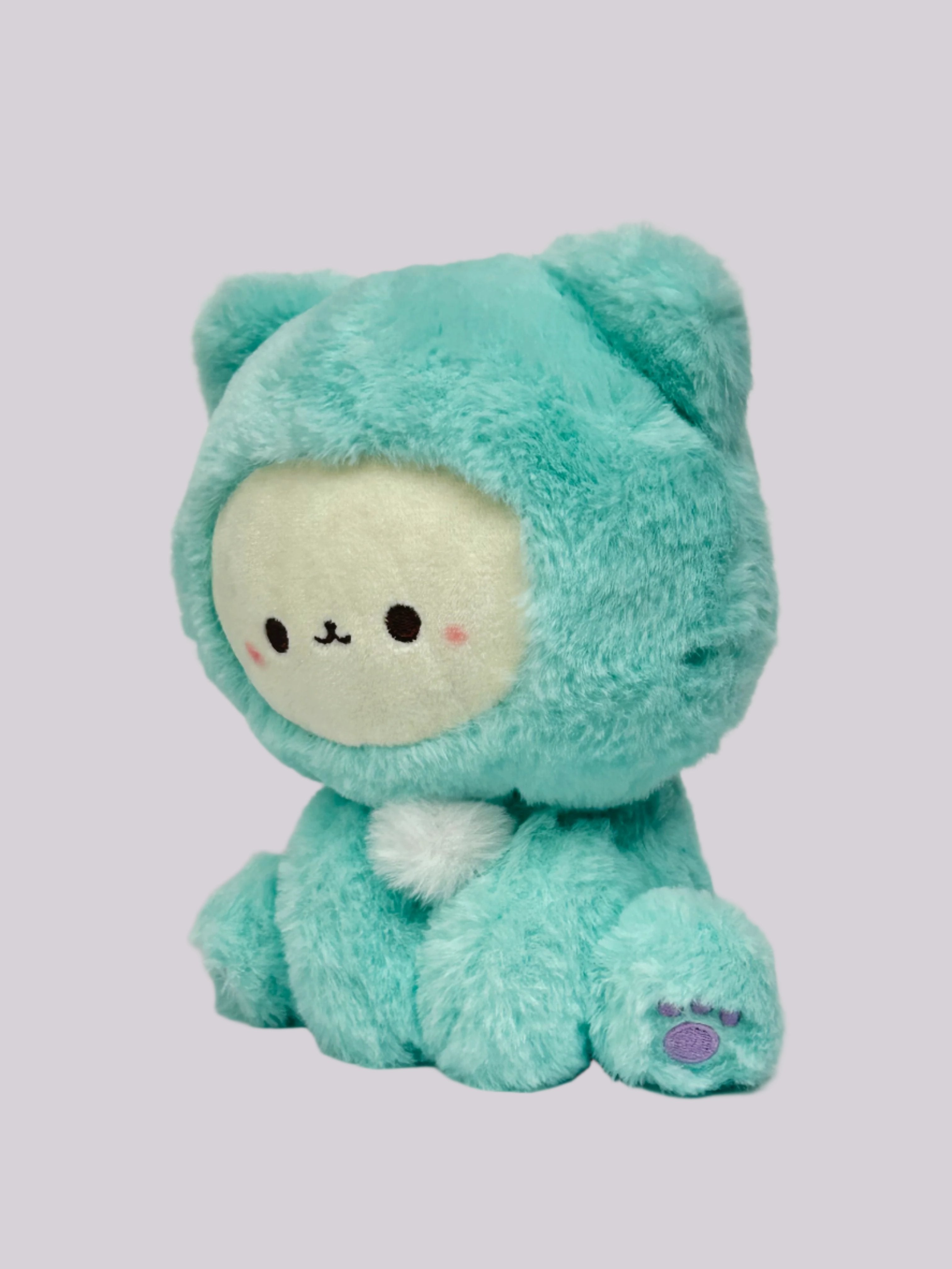 These cuddly Pastel Hooded Animal Plushies are perfect for snuggling at bedtime. Dressed in their soft pastel animal character onesies, they are great for display or for some cozy playtime. Their feet feature individually embroidered shapes making them even cuter with adorable attention to detail! Collect them all or give them as the most adorable gifts!