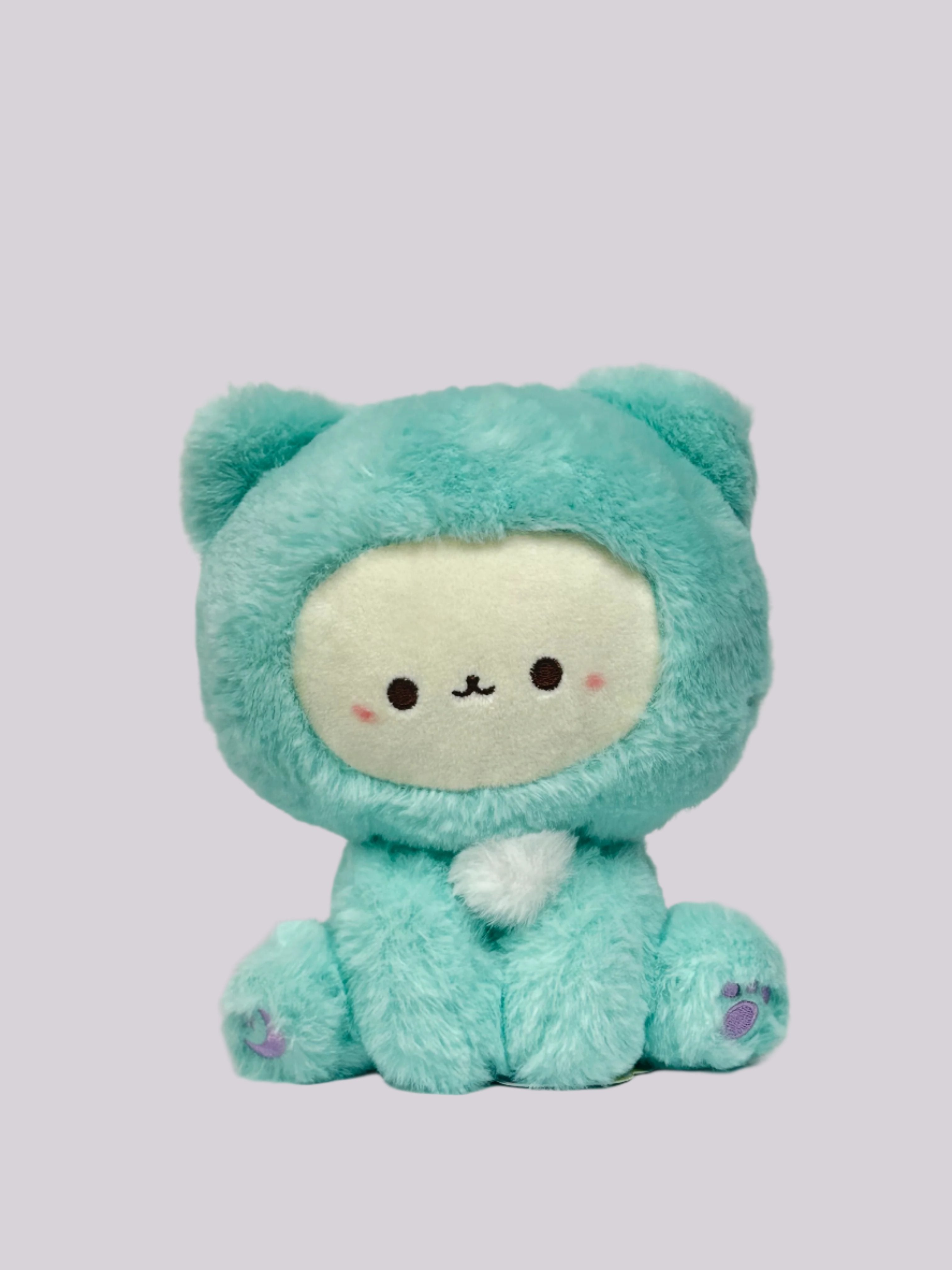 These cuddly Pastel Hooded Animal Plushies are perfect for snuggling at bedtime. Dressed in their soft pastel animal character onesies, they are great for display or for some cozy playtime. Their feet feature individually embroidered shapes making them even cuter with adorable attention to detail! Collect them all or give them as the most adorable gifts!