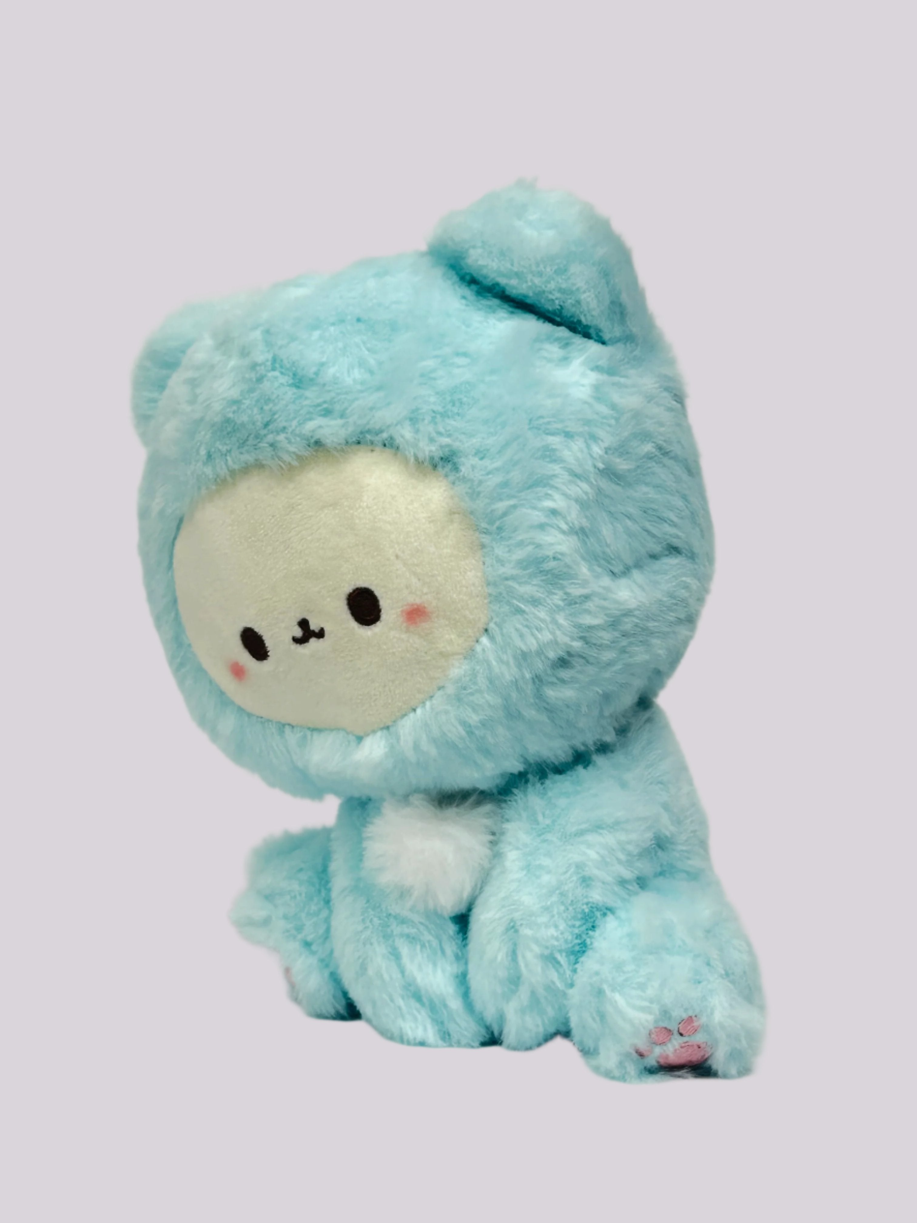 These cuddly Pastel Hooded Animal Plushies are perfect for snuggling at bedtime. Dressed in their soft pastel animal character onesies, they are great for display or for some cozy playtime. Their feet feature individually embroidered shapes making them even cuter with adorable attention to detail! Collect them all or give them as the most adorable gifts!