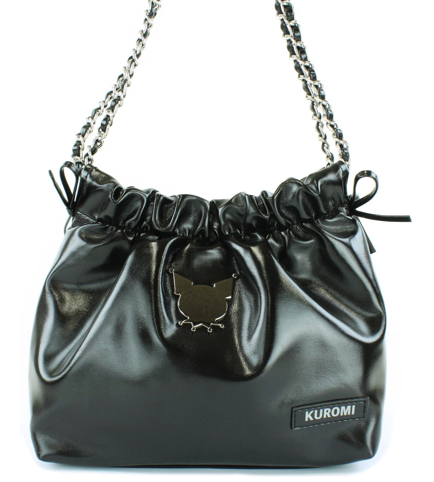 Edge, class and shine meets everyday style with our Kuromi Black Metallic Ribbon Shoulder Bag! This limited edition bag features a stunning black metallic finish that and is adorned with elegant ribbon details and an adorable Kuromi charm. The practical drawstring cinch closure keeps your belongings secure while maintaining easy access. Perfectly sized for daily essentials and featuring a comfortable shoulder strap, this bag combines functionality with kawaii flair.  