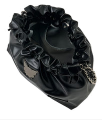Edge, class and shine meets everyday style with our Kuromi Black Metallic Ribbon Shoulder Bag! This limited edition bag features a stunning black metallic finish that and is adorned with elegant ribbon details and an adorable Kuromi charm. The practical drawstring cinch closure keeps your belongings secure while maintaining easy access. Perfectly sized for daily essentials and featuring a comfortable shoulder strap, this bag combines functionality with kawaii flair.  