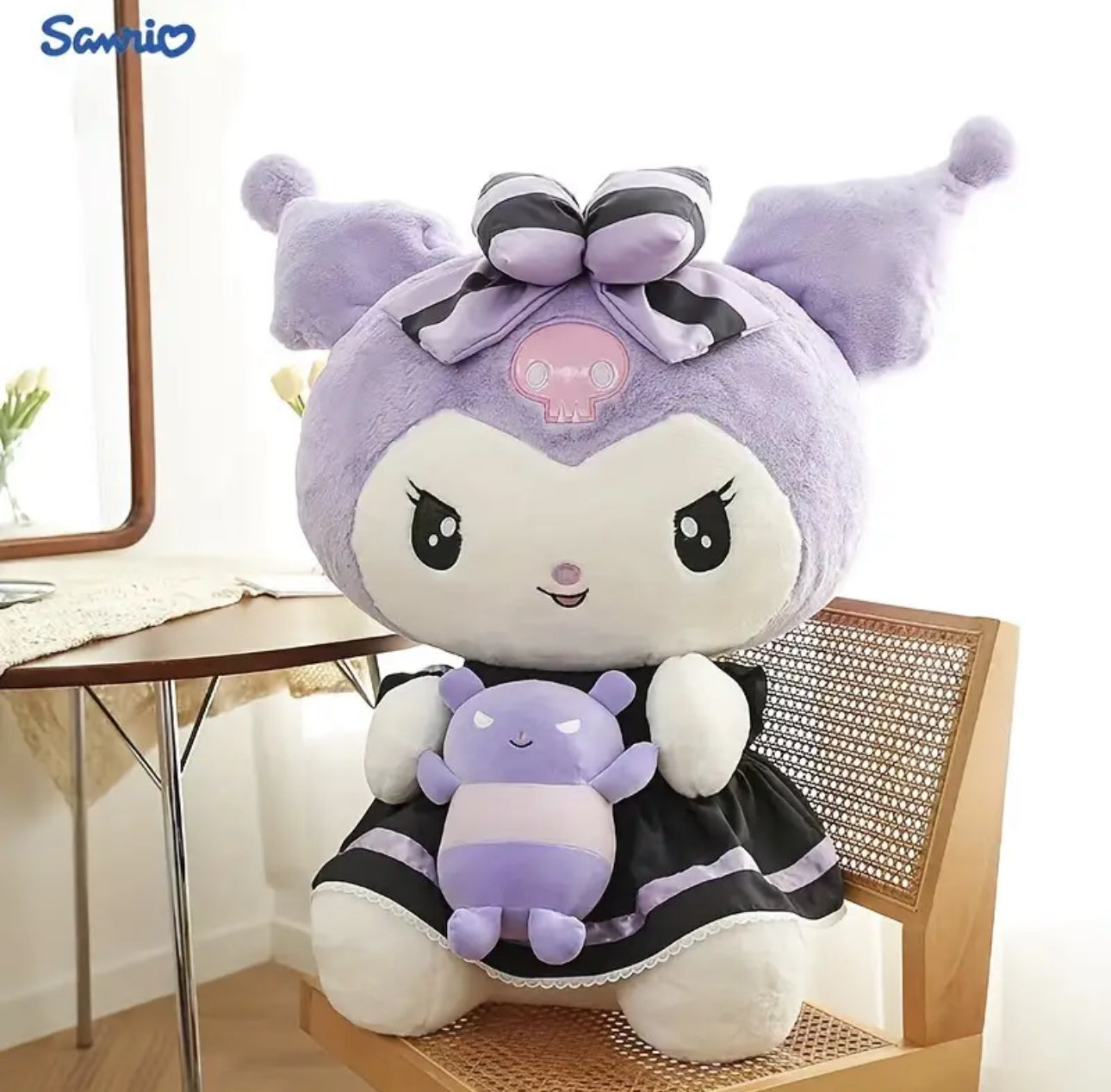 Meet the Kuromi &amp; Baku the Tapir Plushie duo! This delightful plushie features cutie Kuromi in her signature style, rocking bold lilac and black stripes on her dress and head bow, and holding hands with her adorable purple sidekick, Baku the tapir. With their playful expressions and unique designs, they make the perfect pair for any Sanrio or Kuromi fan.