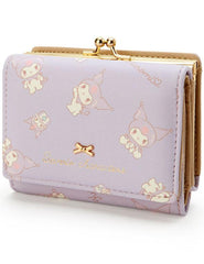 Add a touch of adorable charm to your daily essentials with this YLilac Kuromi Sanrio Gold Bow Wallet! Perfect for fans of the beloved Sanrio character, Kuromi, this wallet is as functional as it is cute.

Featuring Kuromi in a lilac purple design, the wallet is accented with a stylish gold bow and gold clasp, giving it a chic, feminine look.

Made from durable synthetic leather, with multiple compartments for cards, cash, and coins.