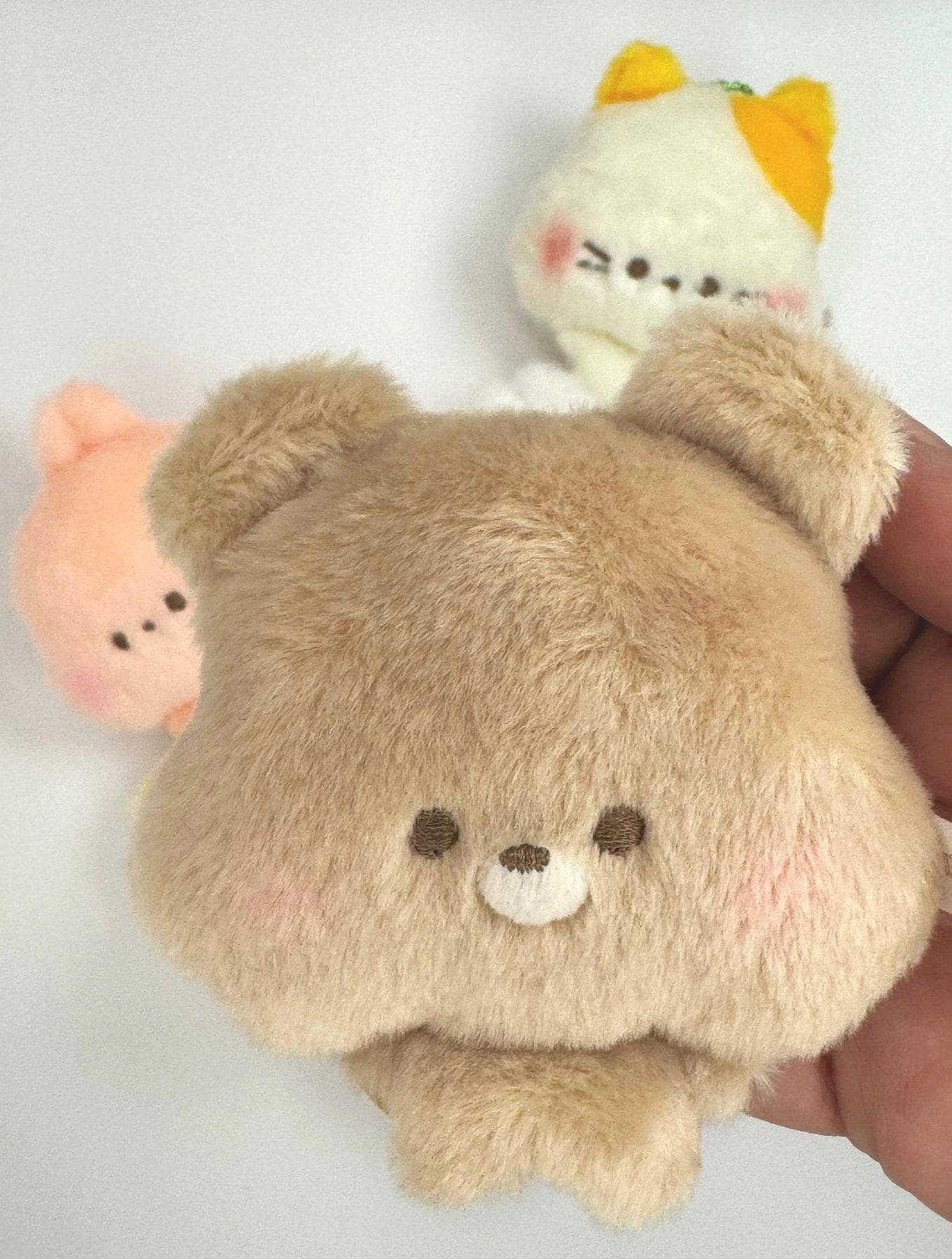 These charming companions are meticulously crafted with soft, high-quality materials that are cuddly and comforting to hold. Each Little Big Head Animals Plush Keychains has great style and character, just look at those perky ears, perfectly posed paws and that subtle cheek shading on the shyest of these shy guys.