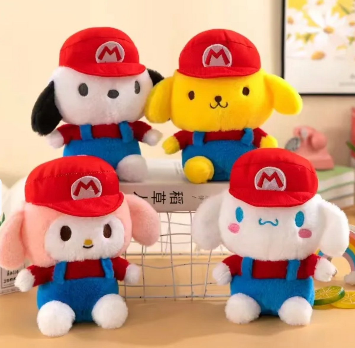 Sanrio’s titans, Pochacco, Pompompurin, My Melody and Cinnamoroll, fabulously don the signature gear (hat and overalls) of Nintendo’s most famous plumber-gone-go kart-racer-gone-smash-bro, Mario! With a soft exterior and embroidered faces, they’re perfect for hugging or displaying proudly in any game room.