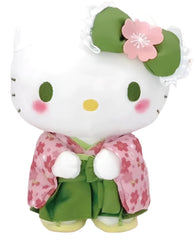 Suppose you miss the beauty of spring and the lovely fragrance of cherry blossoms. Have it forever with the Matcha Sakura Garden Hello Kitty Kimono Plushie, an enchanting mix of traditional Japanese elegance and kawaii charm. This plushie is made from soft, huggable material, perfect for snuggling or adding a cute touch to your space.

Hello Kitty looks ever so classy in her detailed kimono and her lovely green bow makes her as sweet as a flower. The vibrant green color and delicate sakura motifs give her a