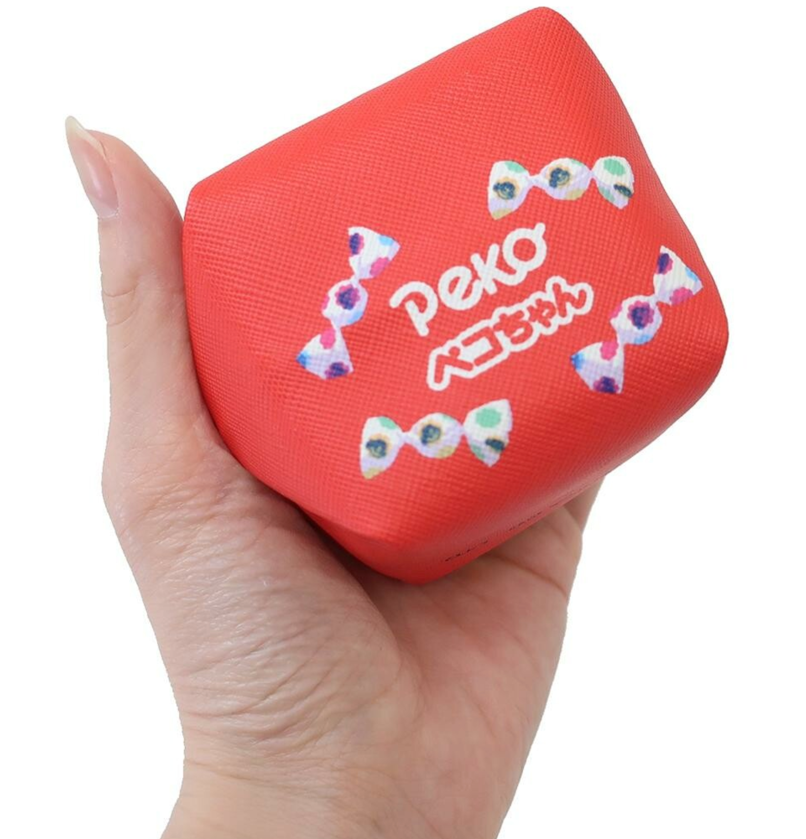 This Milky Candy Peko Girl Square Style Mini Purse is the perfect gift for those who love a nostalgic moment! Its charming design brings a touch of retro delight to anything you put it on. It is sure to spark joy and fond memories of this beloved character!  Its compact size is perfect for small items like your lip balm or earphones.