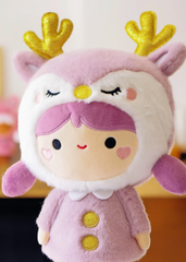 A special piece designed for collectors, plush enthusiasts, and those seeking a unique gift that stands the test of time. Soft lavender plush and sparkly antlers give this Momiji Twinkle Plum Girl Plushie strong woodland creature vibes.