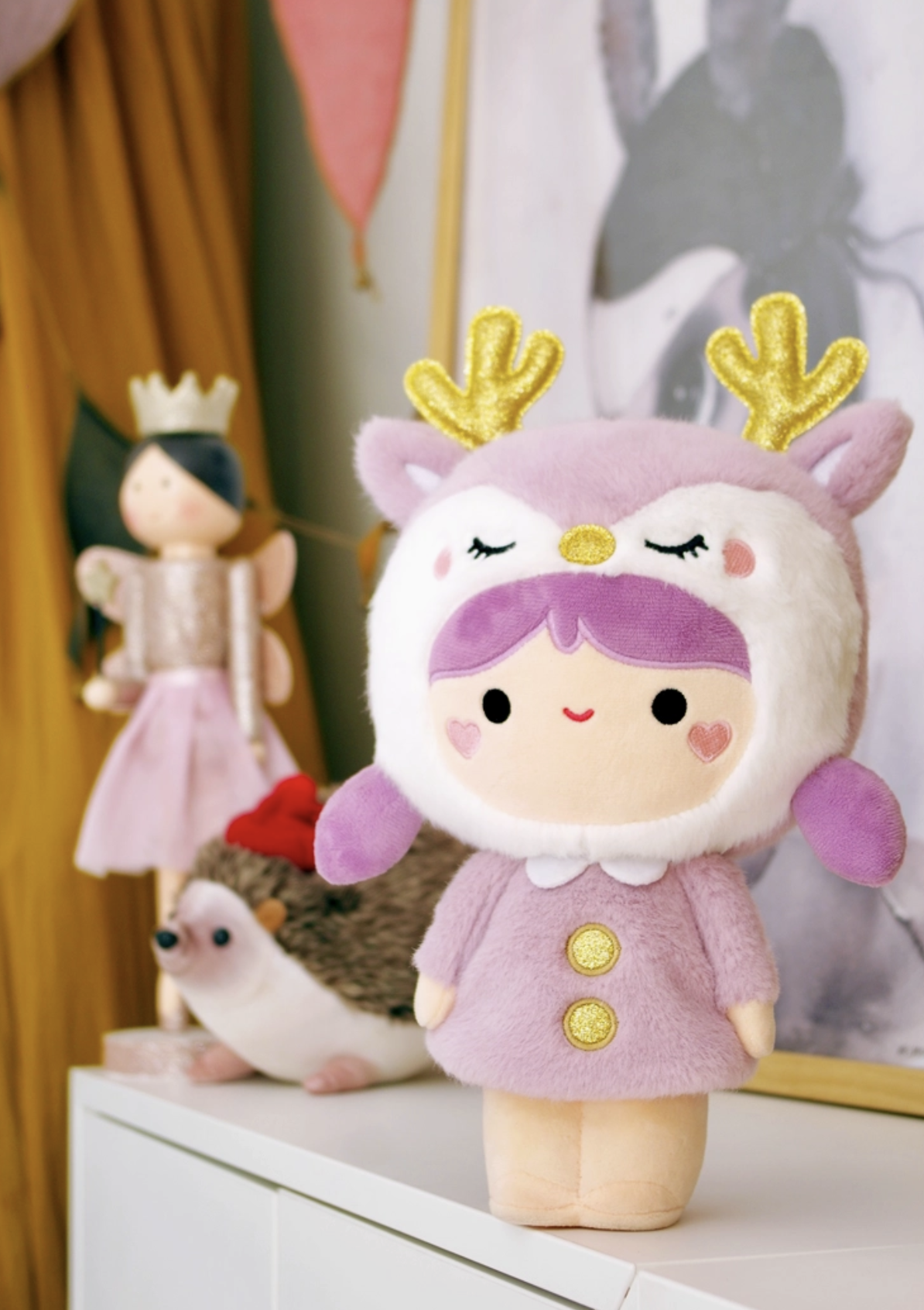 A special piece designed for collectors, plush enthusiasts, and those seeking a unique gift that stands the test of time. Soft lavender plush and sparkly antlers give this Momiji Twinkle Plum Girl Plushie strong woodland creature vibes.