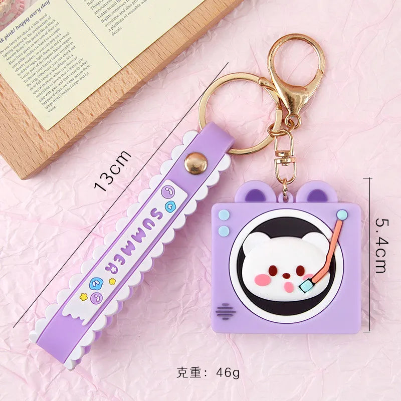 Oh, this bear has definitely got that on vinyl! Music lovers, if you like purple, lace, records, turntables, kawaii little teddy bears and finding your keys easily, then this keychain was made for you!  The Musical Festival Bear Record Lavender Turntable Keychain has a dainty, urban look. Attach it to your keys, backpack or bag for a dash of cute and a sprinkle of hip.