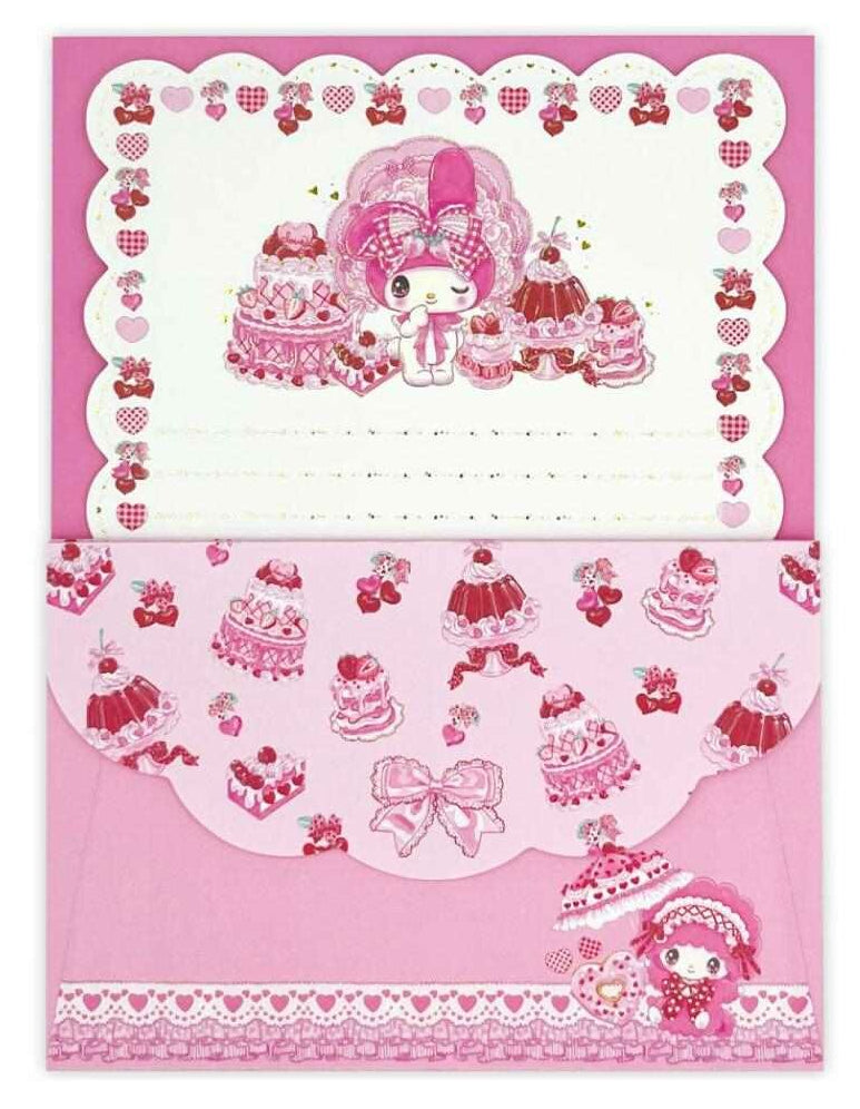 This My Melody Sanrio X Ame No Mori Fumika Collaboration Letter Set blends classic Sanrio charm with the delicate, whimsical style of acclaimed Japanese illustrator Ame No Mori Fumika. The set includes eight sheets of stationery and four envelopes, perfect for handwritten notes, letters, or gifting. Compact and beautifully designed, it’s a collectible piece for fans who love both Sanrio and unique, artistic collaborations.