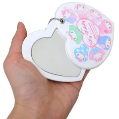 Celebrate My Melody's 50th Anniversary in style with our exclusive Girly Pop Heart-shaped Slide Mirror! This special commemorative piece combines functionality with kawaii charm, featuring our beloved bunny friend in a perfectly pink heart design. The clever sliding mirror mechanism keeps the reflective surface protected while showcasing My Melody's adorable anniversary artwork. Perfect for quick touch-ups on the go, this compact mirror brings together 50 years of cuteness with practical everyday use!