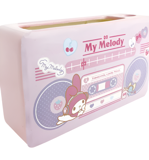 Add a touch of nostalgia to your workspace with this collectible My Melody Porcelain Boombox 90s Style Desk Organizer.  This charming organizer features the beloved Sanrio character in a retro design, perfect for fans of the 90s aesthetic. With compartments for pens, and even your phone, it's a functional and adorable addition to any desk.