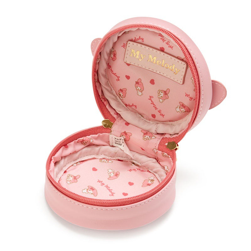 Perfect for gifting or keeping, this My Melody Circle Jewelry Box features irresistible cuteness and everyday functionality! It's compact and fits effortlessly into your bag or sits prettily on your vanity. The durable construction ensures your jewelry stays protected, while the smooth, rounded shape adds a touch of playful style to your collection.