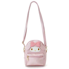 It's the perfect blend of function and fashion, making it an ideal accessory for My Melody fans or anyone who enjoys cute and practical bags. Includes a main zippered compartment, a small front pocket with a zipper, and interior pockets to keep your items organized and secure.