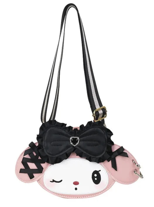 Giving major high fashion vibes, our My Melody Diva Vibes Shoulder Bag is a limited edition accessory for those who&nbsp;love blending adorable charm with fashionable flair. This bag is a must-have for fans of My Melody who want to carry a touch of kawaii magic wherever they go.

Featuring My Melody’s sweet face and signature bow, paired with glamorous accents for a sophisticated twist, like the jewel embellished bow, corset detailing on the ears, and two heart-shaped keyrings as "earrings."