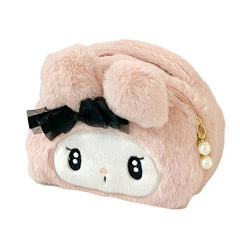 Reach for your makeup bag with delight and start your enhancing session with a smile. Sanrio's My Melody Plush Makeup Bag is cute, fuzzy, fashionable and everything else a happy, warm day's start should be. The soft exterior, embroidered face and sweet, delicate bow make for a wonderful kawaii style experience.