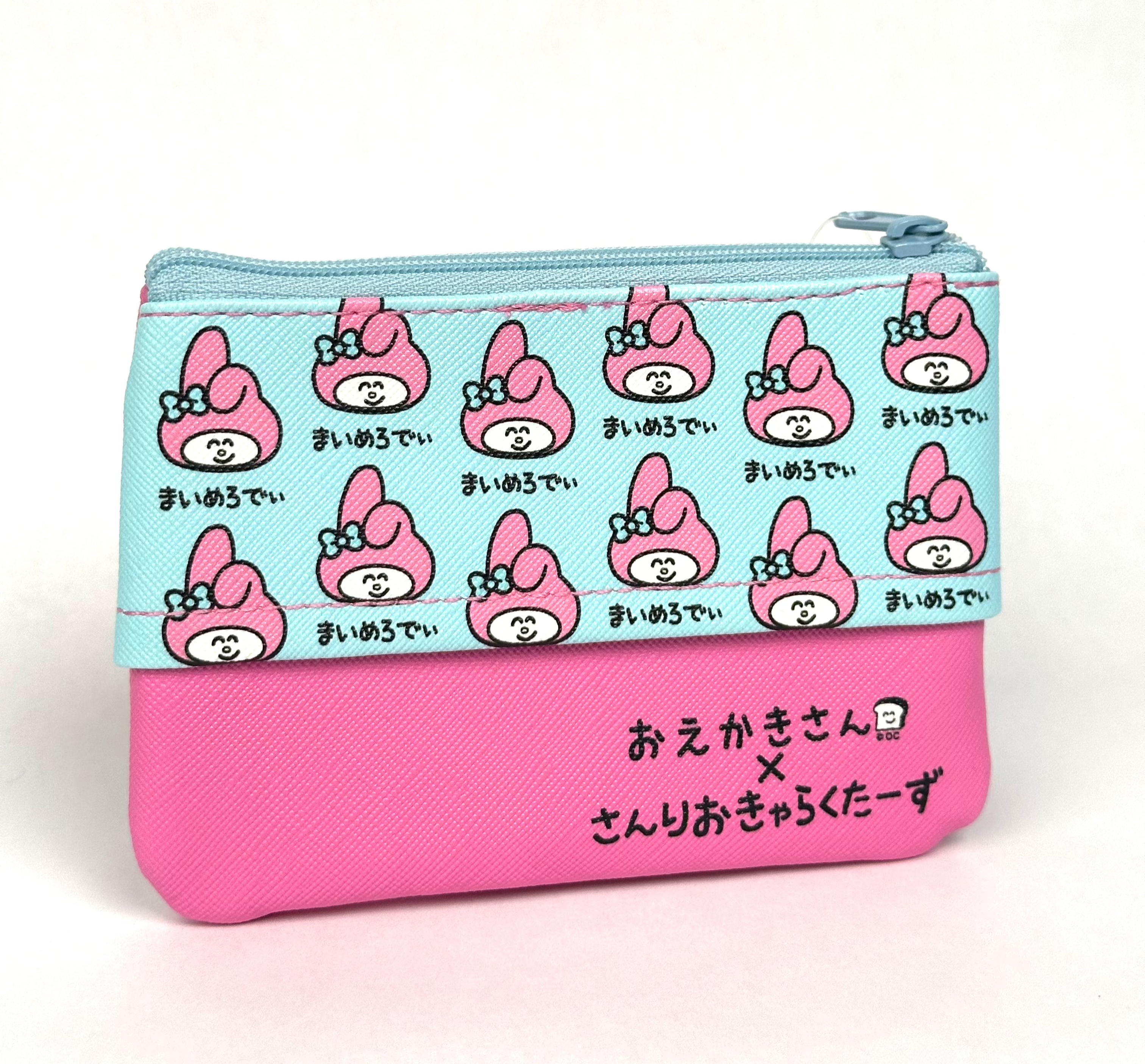 Get ready to fall in love with our limited edition My Melody Sanrio x Oekaki-san Pouch! The front of the pouch features a delightful image of the beloved My Melody in a unique style created by the Sanrio x Oekaki-san collab series. 