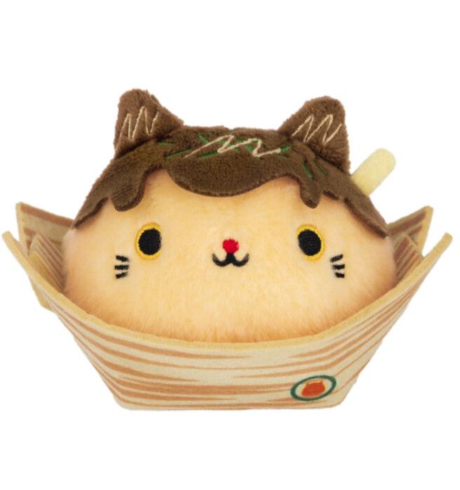 Meet the unique Neko Dango Takoyaki Cat Dumpling Plushie – the purr-fect blend of kawaii and street food fun! Shaped like a traditional dango, this round plush features an adorable cat design inspired by the famous Japanese takoyaki snack, complete with embroidered "sauce" and "topping" details for extra charm. Soft, squishy, and irresistibly cute, it's crafted with plush fabric that’s perfect for cozy cuddles or display.

This Takoyaki Cat Dumpling Plushie is compact enough to fit in your hand and makes a 