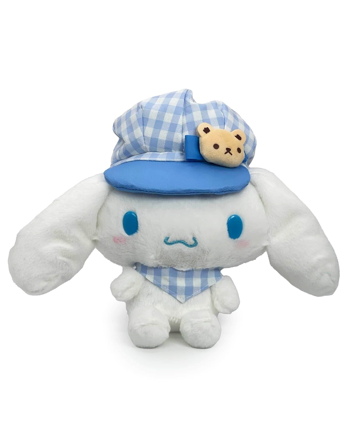 The classic blue gingham print lends a touch of timeless elegance to his attire, while the stylish newsboy hat and neck handkerchief adds a playful and fashionable flair. The Newsboy Cinnamoroll Plushie in Blue Gingham embodies the innocence and sweetness of Cinnamoroll, the beloved Sanrio character adored by fans around the world.