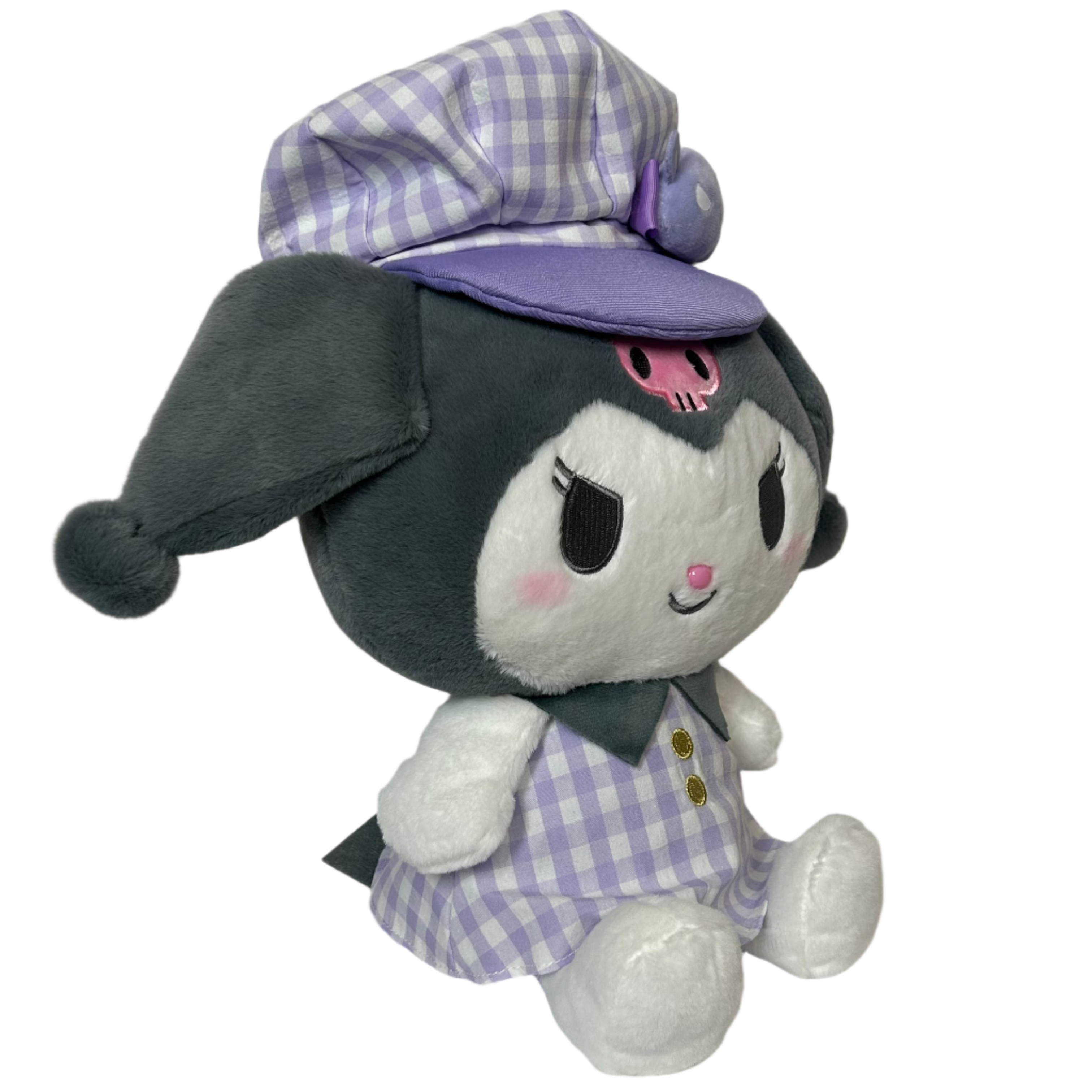 The indelible Kuromi, now donning a stylish newsboy hat and adorned in a trendy purple gingham outfit! This adorable plushie is a must-have for fans of Sanrio's mischievous character Kuromi, known for her spunky personality.

Dressed to impress in a purple gingham outfit, this Newsboy Kuromi Plushie in Purple Gingham adds a touch of fashionable flair to any collection. Whether displayed on a shelf, nestled among pillows, or snuggled up in bed, she's sure to bring a smile to your face every time you see her.