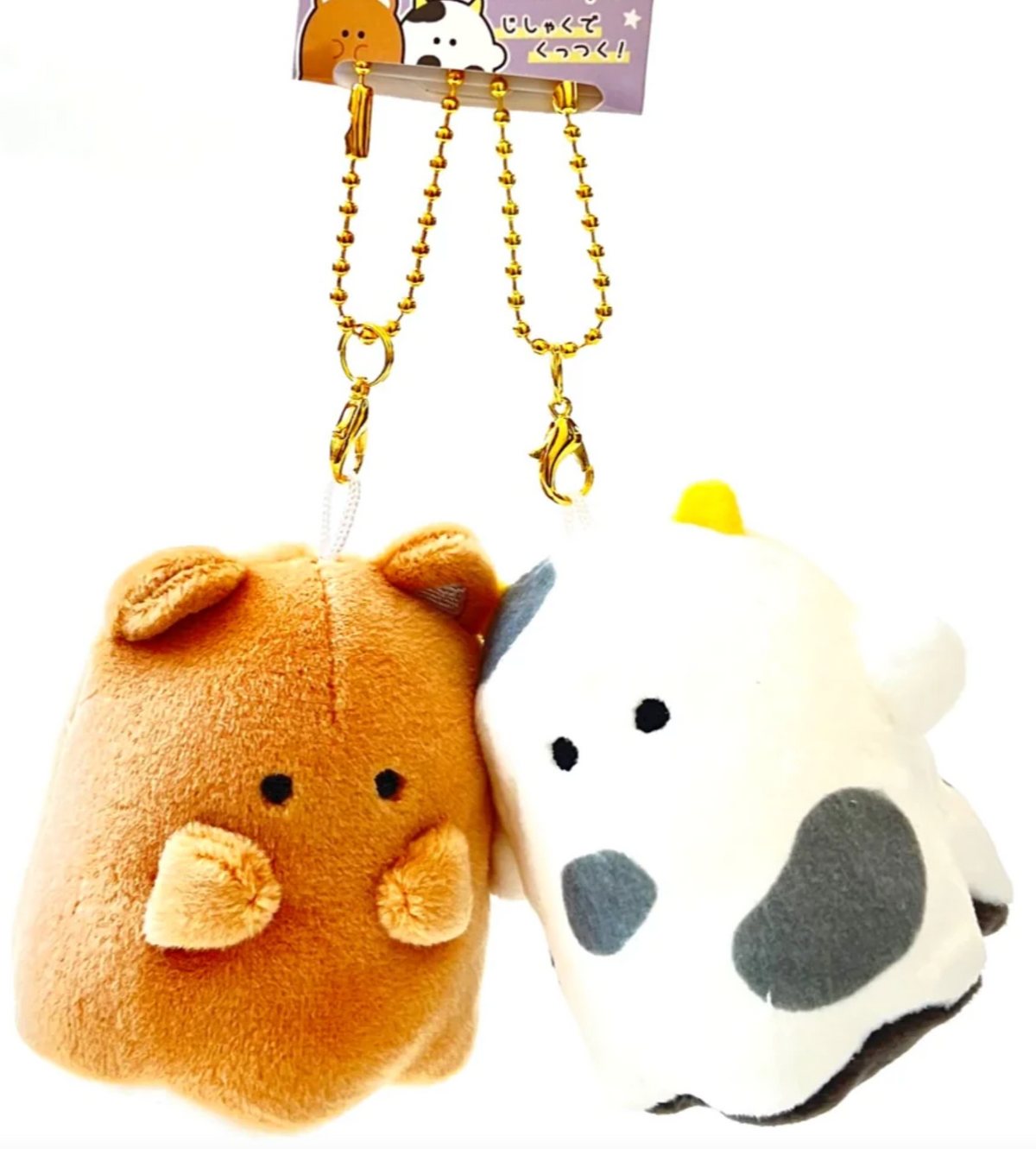 Meet your new companion from Obakane Farm - the Ghost Buddy Magnetic Plush Keychain! This whimsical keychain features a friendly ghost design that's both cute and spooky. With its magnetic hands, it easily attaches to any metallic surface, making it perfect for adding a playful touch to your keys, bag, or fridge.