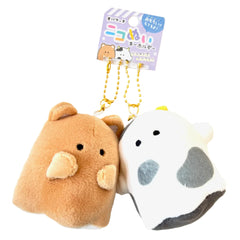 Meet your new companion from Obakane Farm - the Ghost Buddy Magnetic Plush Keychain! This whimsical keychain features a friendly ghost design that's both cute and spooky. With its magnetic hands, it easily attaches to any metallic surface, making it perfect for adding a playful touch to your keys, bag, or fridge.

Crafted with soft, plush materials, it's as huggable as it is charming. Whether you're a fan of the paranormal or simply love unique accessories, this Ghost Buddy is ready to haunt your everyday.