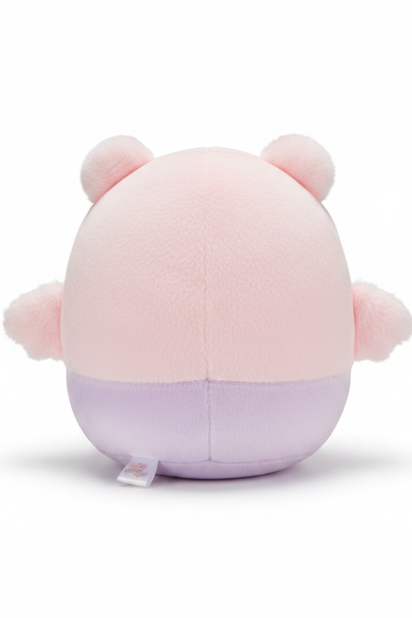 Bundle up for the cutest little adventure with our Owl Bear Shirokuma Pink Plush! Shirokuma is dressed in an irresistibly soft pink owl costume, complete with tiny wings, embroidered details, and a sweet pastel lavender belly. With its round, cuddly shape and gentle colors, this plush makes an adorable companion for snuggling, displaying, or adding a cozy touch to your collection.