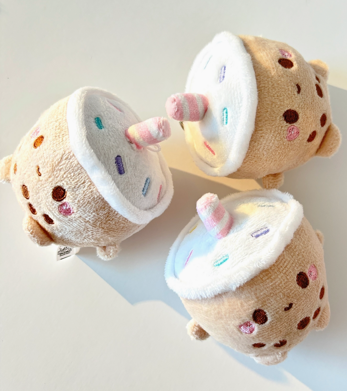 Say hello to the Mini Milky Plush Keychain, your new favorite chonky boba buddy! With its pastel candy sprinkles and sweet embroidery, this little guy is sure to add a burst of kawaii charm to your keys, bag, or backpack.