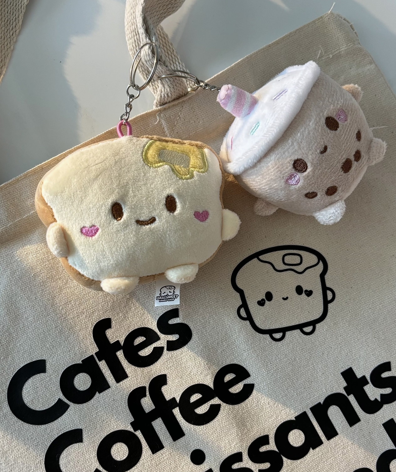 Say hello to the Mini Milky Plush Keychain, your new favorite chonky boba buddy! With its pastel candy sprinkles and sweet embroidery, this little guy is sure to add a burst of kawaii charm to your keys, bag, or backpack.