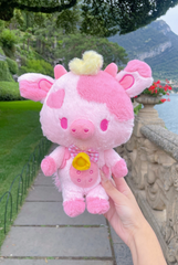 The Pink Hearts Jolene the Cow Plushie is ready to mooo-ve into your heart and become your new best friend. Perfect for cuddle sessions and long conversations, this delightful plush won't steer you wrong!