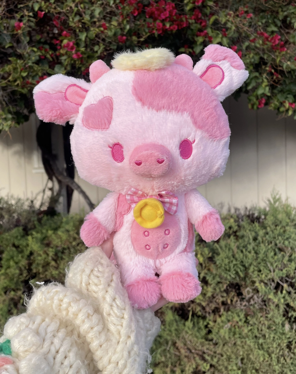 The Pink Hearts Jolene the Cow Plushie is ready to mooo-ve into your heart and become your new best friend. Perfect for cuddle sessions and long conversations, this delightful plush won't steer you wrong!