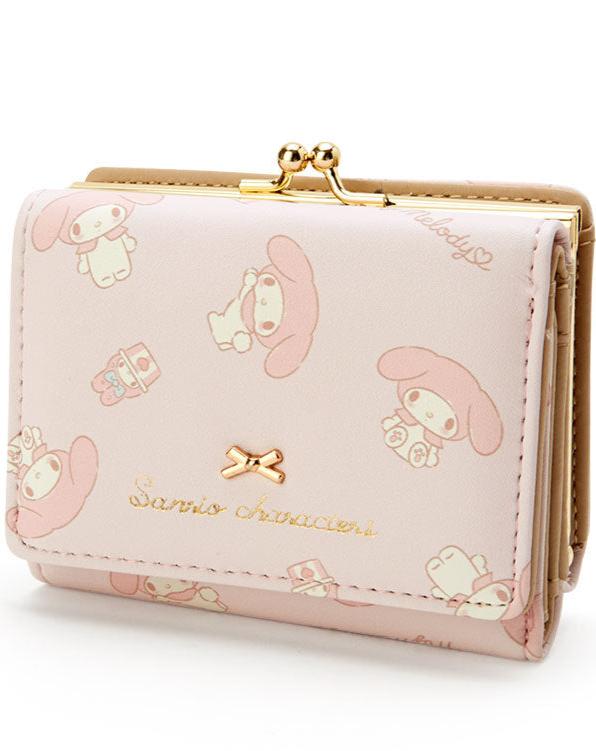 Add a touch of adorable charm to your daily essentials with this Pink My Melody Sanrio Gold Bow Wallet! Perfect for fans of the beloved Sanrio character, My Melody, this wallet is as functional as it is cute.

Featuring My Melody in a pastel pink design, the wallet is accented with a stylish gold bow and gold clasp, giving it a chic, feminine look.

Made from durable synthetic leather, with multiple compartments for cards, cash, and coins.