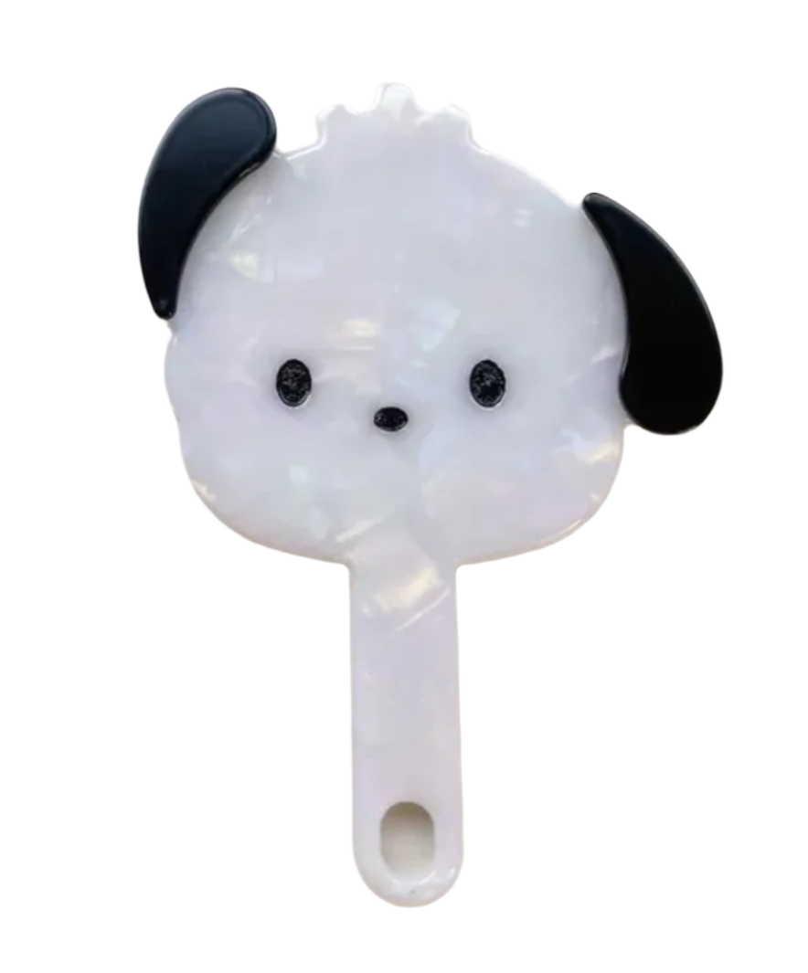 Let Pochacco's cute face helps you maintain your own adorable face with our Pochacco Puppy Handheld Travel Mirror! What a duo!  This handheld mirror is great for traveling, throwing in your day bag or backpack, makeup bag, or leaving on your desk for quick touch-ups. A lovely marbled design adds extra flair to this already irresistible vanity mirror.