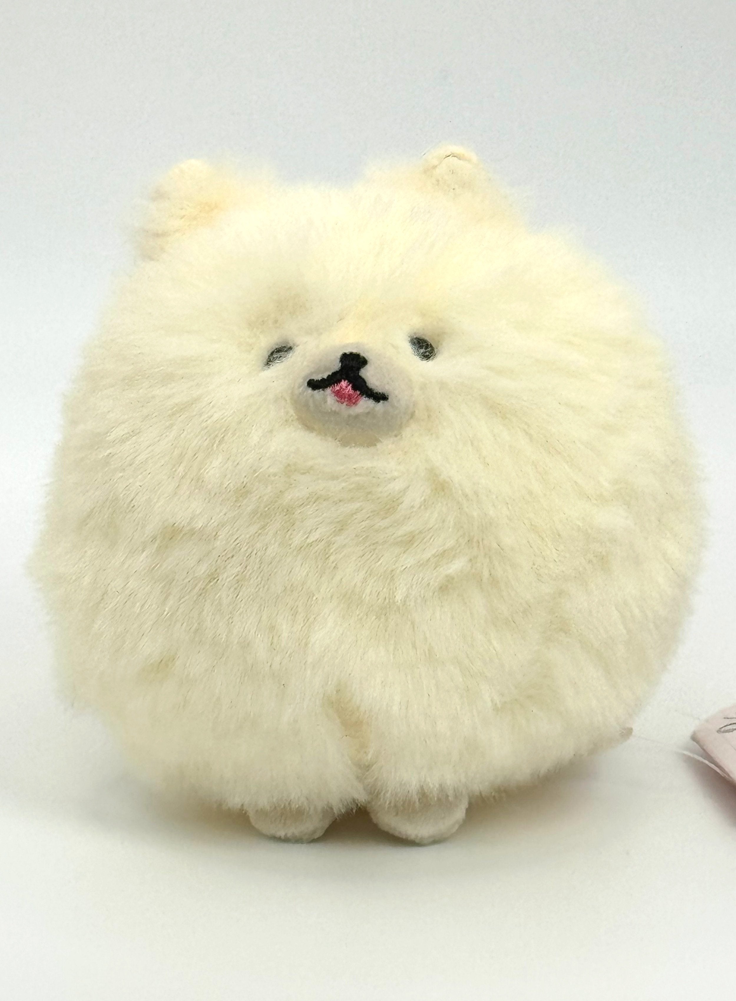 Pomeranian Tail Shaker Plushies, adorable and hilarious! These fluffy companions wiggle their behinds when their tails are pulled, providing a very adorable but also very grounding sensory experience.  Crafted with soft, plush materials, they're perfect for cuddling or amusing when the day just downright calls for it. Pomeranian Tail Shaker Plushies are inspired by that happy dog that is just over-the-top ecstatic to see you. Imagine this as a thoughtful and fun gift for a dog lover.