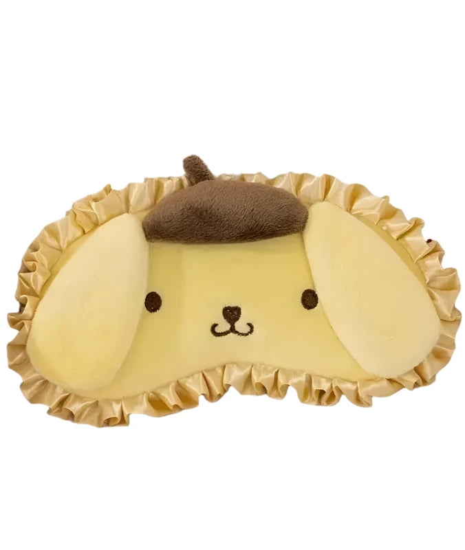 Drift off to dreamland in style with the Pompompurin Ruffle Plush Bedtime Sleep Mask with Ice Pack by Sanrio! Featuring your favorite Sanrio characters, these sleep masks are as comfortable as they are adorable. Designed with soft plush material and delicate ruffles, with ultra cute details like bows or embroidered heart-shaped cheeks, they’re perfect for blocking out light and adding some welcome cuteness to your bedtime routine.

Available in many lovable characters: My Melody, Pochacco, Pompompurin, Hang