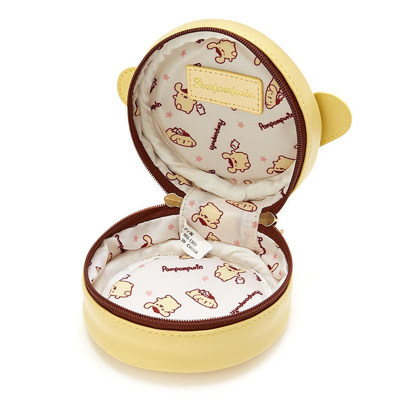 Perfect for gifting or keeping, this Pompompurin Travel Jewelry Box features irresistible cuteness and everyday functionality! It's compact and fits effortlessly into your bag or sits prettily on your vanity. The durable construction ensures your jewelry stays protected, while the smooth, rounded shape adds a touch of playful style to your collection.