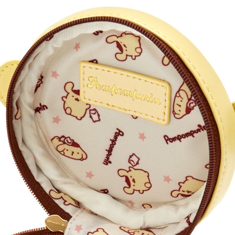 Perfect for gifting or keeping, this Pompompurin Travel Jewelry Box features irresistible cuteness and everyday functionality! It's compact and fits effortlessly into your bag or sits prettily on your vanity. The durable construction ensures your jewelry stays protected, while the smooth, rounded shape adds a touch of playful style to your collection.