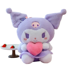 Sassy Kuromi reveals her sweet side in the Angel Wings Huggable Heart Kuromi Plushie! This cutie shows the beloved Sanrio character Kuromi with angelic wings hugging a pink plush heart for a truly charming plush experience. Perfect for cuddles or as a decorative piece.