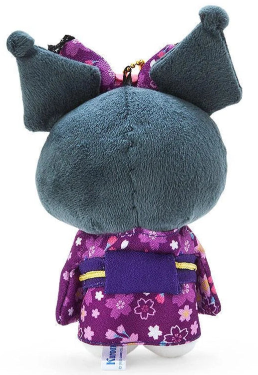 Suppose you miss the beauty of spring and the lovely fragrance of cherry blossoms. Have it forever with the Purple Sakura Flower Kuromi Kimono Plush keychain, an enchanting mix of traditional Japanese elegance and kawaii charm. This mascot keychain is made from soft, huggable material, which is perfect for adding a cute touch to your on the go vibe.

Kuromi looks ever so classy in her detailed kimono and lovely purple bow making her as sweet as a flower. The elegent purple color and delicate sakura motifs