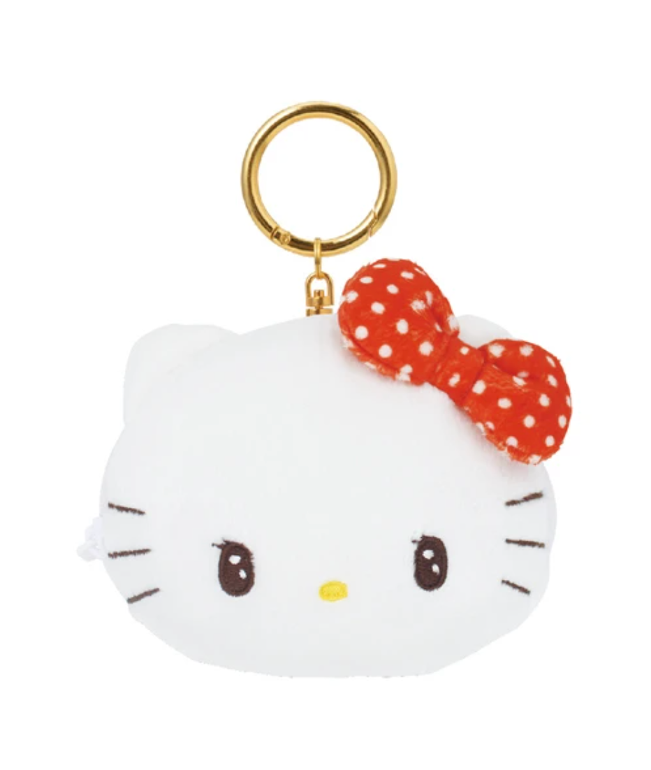 The classic Sanrio characters you know, just with added retro flair! This Retro Pop Hello Kitty Pouch Keychain can be clipped on your keys or bag for an extra cute touch.  The distinguished polka dot red bow furthers the sweetness of Hello Kitty's adorable expression! This keychain even comes with a small pouch for storing little items, adding cuteness to your purse and providing extra storage.