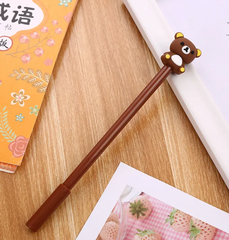 Rilakkuma, the beloved bear from Japanese company San-X, appears here atop a classic looking pen. The Rilakkuma Brown Bear Gel Pen glides easy and makes for a great companion to your writing, signing and designing needs. Add this to your kawaii study materials or stationary collections.