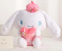 This delightful plushie combines Cinnamoroll’s happy-go-lucky personality with a romantic twist, featuring a design inspired by roses and chocolates. Perfect for fans of Sanrio who love over-the-top sweetness, the Roses 'n Chocolates Cinnamoroll Plushie combines classic floral rose patterns with Cinnamoroll’s signature sweet ‘tude.

It’s the perfect blend of classic style and Sanrio cuteness!