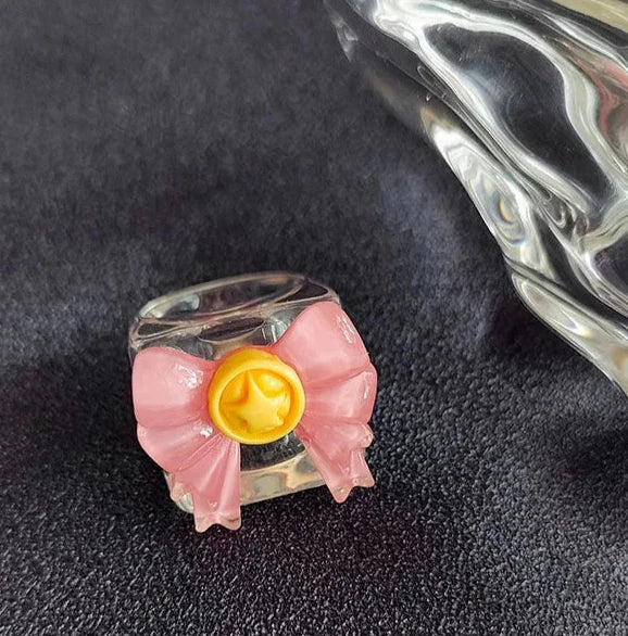 Channel your inner Sailor Guardian with this beautifully crafted Sailor Moon-inspired resin ring. Fans of the beloved anime will notice how this ring captures the essence of Sailor Moon’s magical world in a chic and wearable Kawaii street-style accessory.