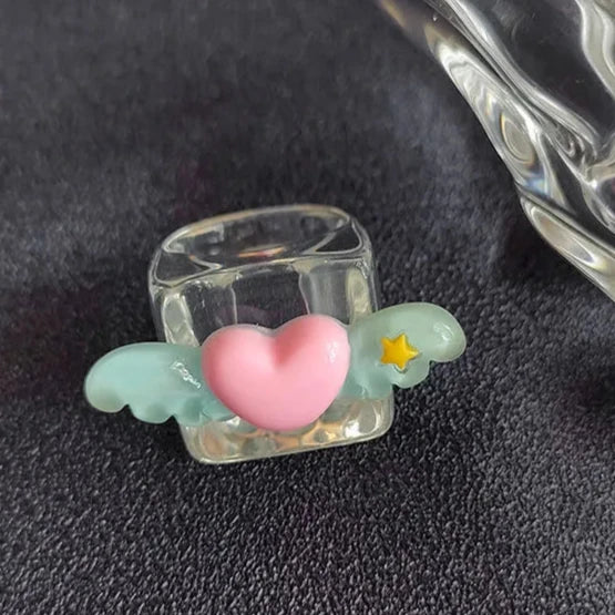 Channel your inner Sailor Guardian with this beautifully crafted Sailor Moon-inspired resin ring. Fans of the beloved anime will notice how this ring captures the essence of Sailor Moon’s magical world in a chic and wearable Kawaii street-style accessory.