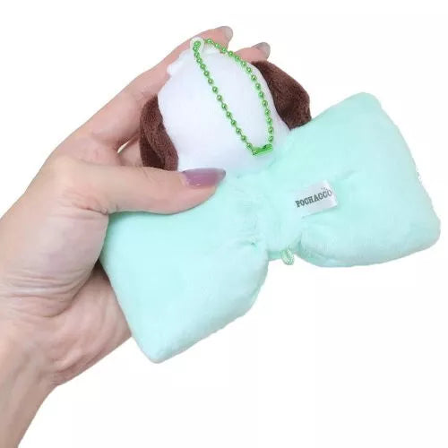 Classic Sanrio characters are featured as their adorable selves, plush style, at the center of a cutie pie bow. The embroidered character name elevates this Big Bow Pochacco Plush Keychain