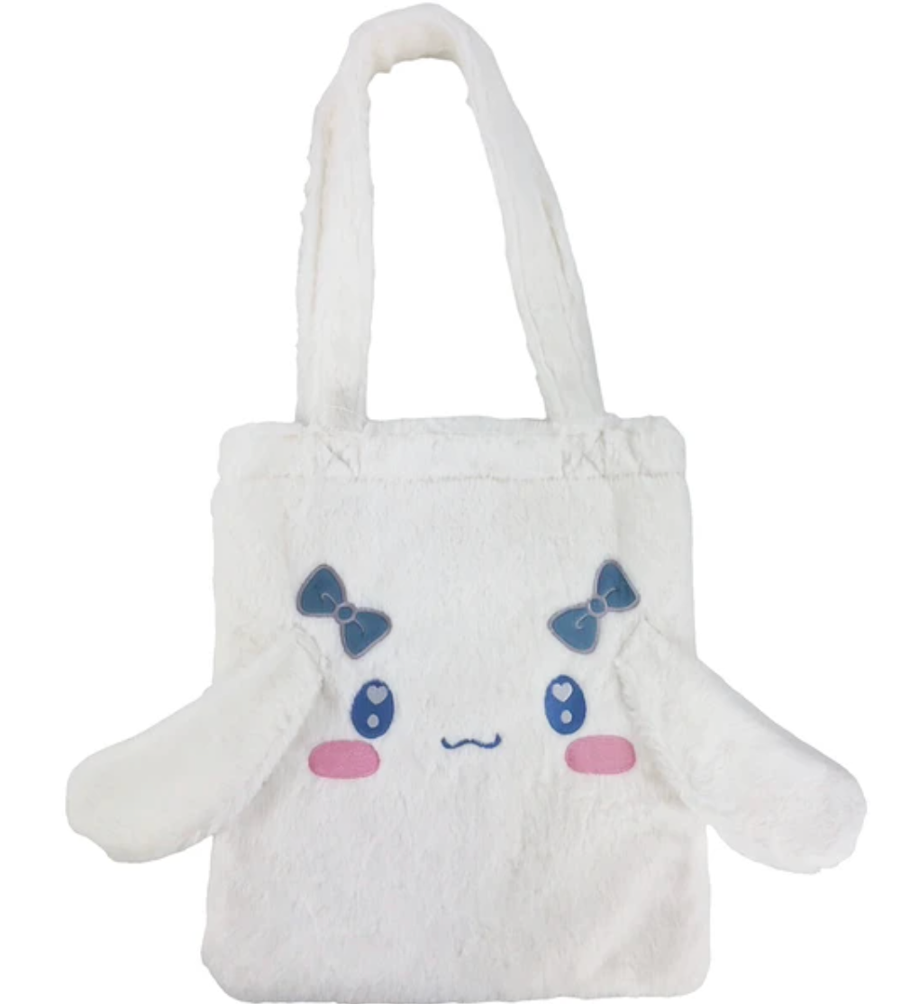 Sanrio’s soft Cinnamoroll Fuzzy Feelings Tote Bag is functional and stylish. With a pair of blue bows, signature floppy ears and embroidered heart eyes. Show your plush love while on the move.