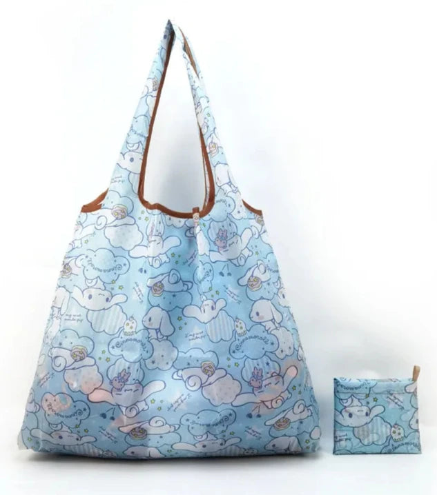 Help reduce plastic waste with the Sweet &amp; Sustainable Cinnamoroll Reusable Shopping Bag \by Sanrio. Adorned with delightful Cinnamoroll graphics and sweet accents, this precious light blue bag is as stylish as it is functional.&nbsp;