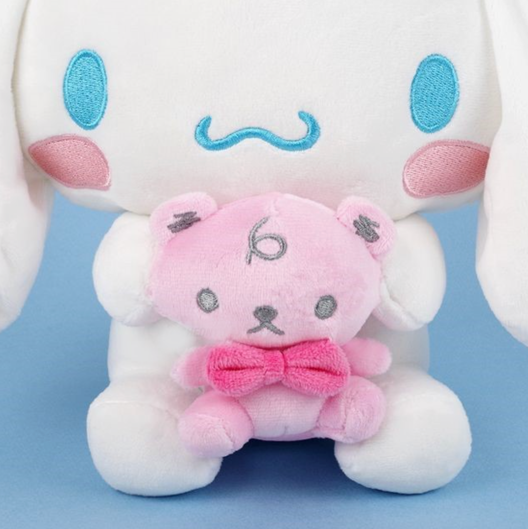 Add a dose of happiness to your life with the adorable Cinnamoroll and Mascot Plushie, featuring your favorite character holding their beloved mascot.  This charming plushie is the perfect gift or decoration to make your space extra kawaii and bring a smile to your face every day!