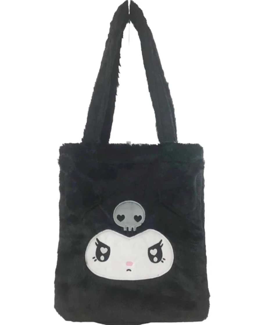 Sanrio’s soft Kuromi Fuzzy Feelings Tote Bag is functional and stylish. With black bow, signature floppy ears and embroidered heart eyes. Show your plush love while on the move.